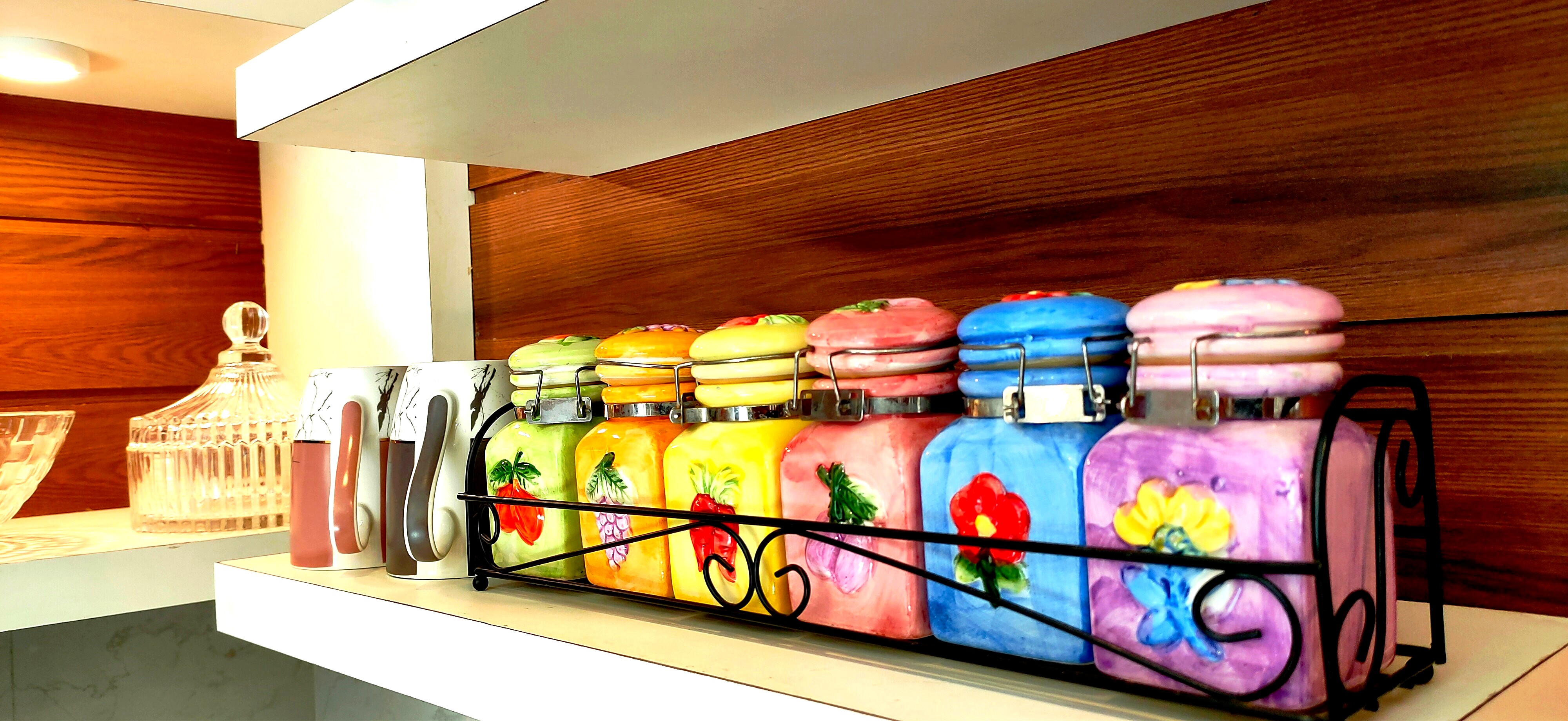 Fully equipped kitchen with storage in a Sukh Vaas apartment